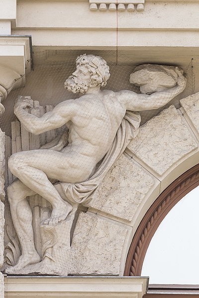 Spandrel figure composition at the avant-corps at the Bellariastraße, Demeter, Triptolemos, Briareos, Enkelados, Faun and Artemis.six figures and three keystones: Flora, Zeus, Vesta