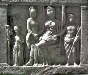 Votive relief of Demeter, Persephone, and Cerberus Guardian Hound of Hades, showcasing the connection to Hades