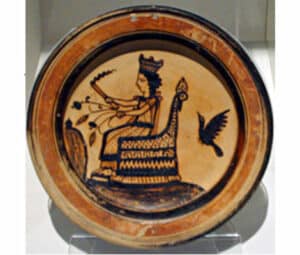 Plate showcasing Demeter on her throne surrounded by symbols of harvest and life.