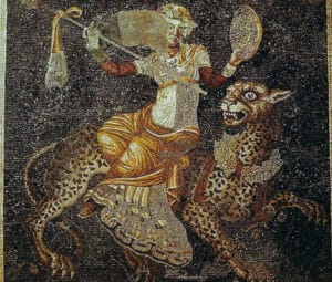 Dionysus with ivy wreath, holding thyrsos atop a panther