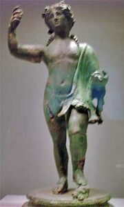 Statue of Dionysus, god of wine, on a circular base